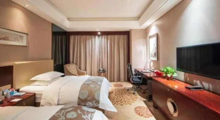 Bed in Zhengzhou Swan City International Hotel