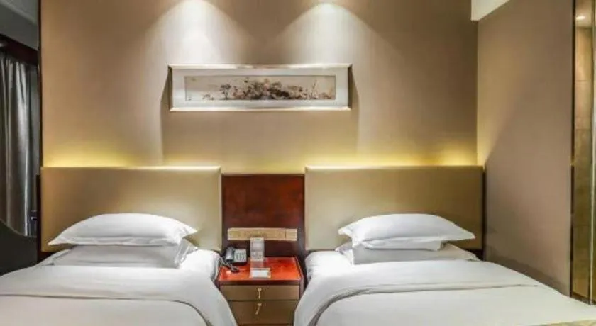Bed in Zhengzhou Swan City International Hotel