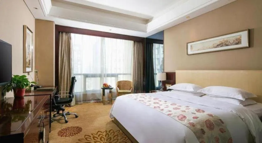 Bed in Zhengzhou Swan City International Hotel