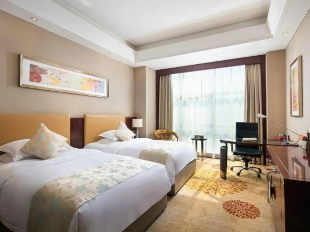 Bed in Zhengzhou Swan City International Hotel