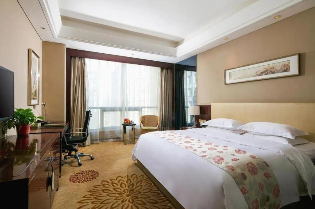 Bed in Zhengzhou Swan City International Hotel