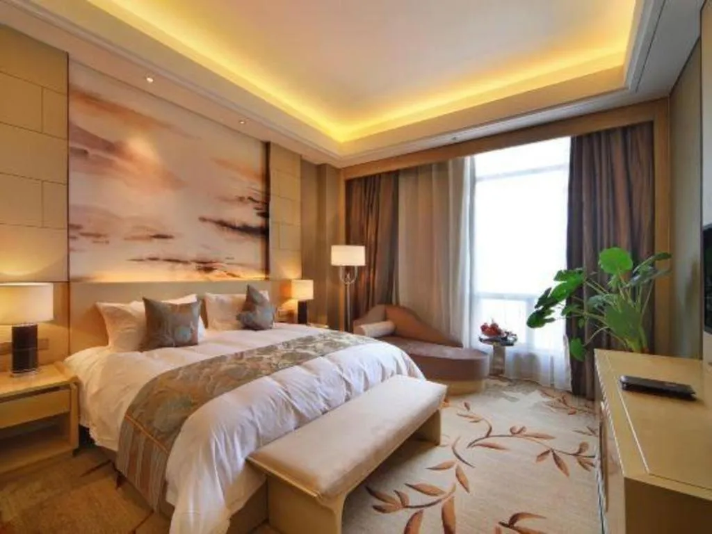 Bed in Zhengzhou Swan City International Hotel