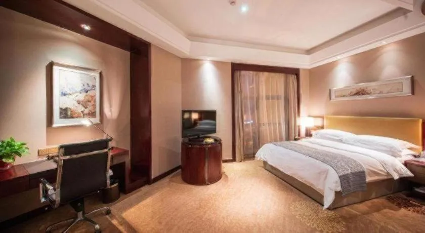 Bed in Zhengzhou Swan City International Hotel