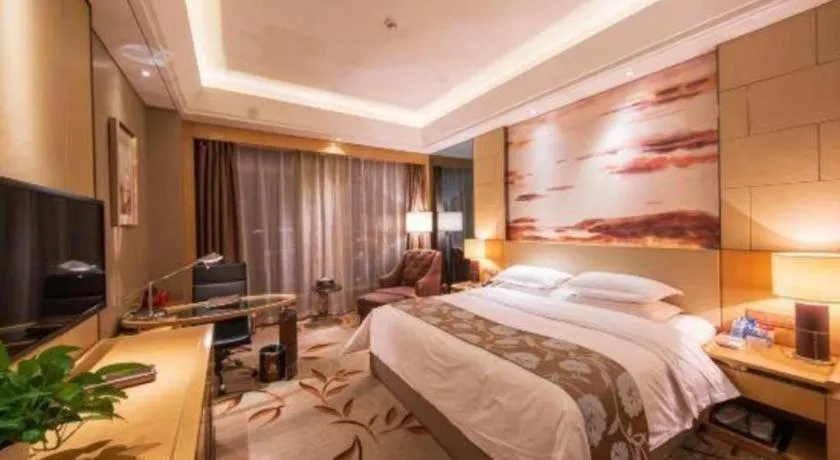 Bed in Zhengzhou Swan City International Hotel