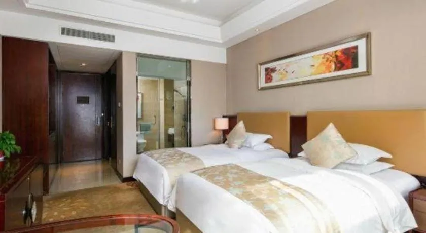 Bed in Zhengzhou Swan City International Hotel