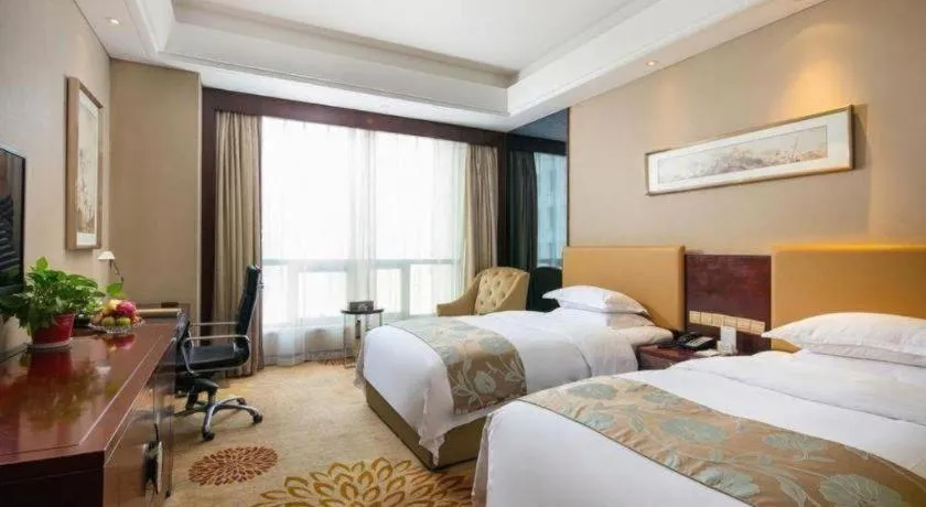 Bed in Zhengzhou Swan City International Hotel