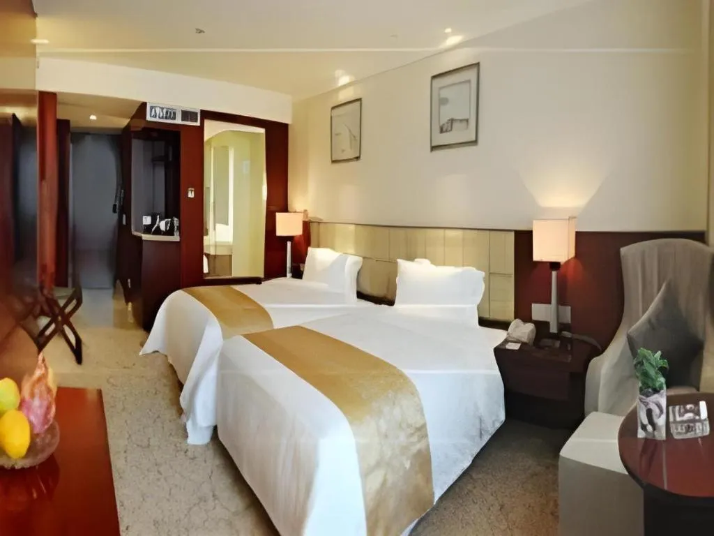 Bed in Chengdu Yinsheng International Hotel