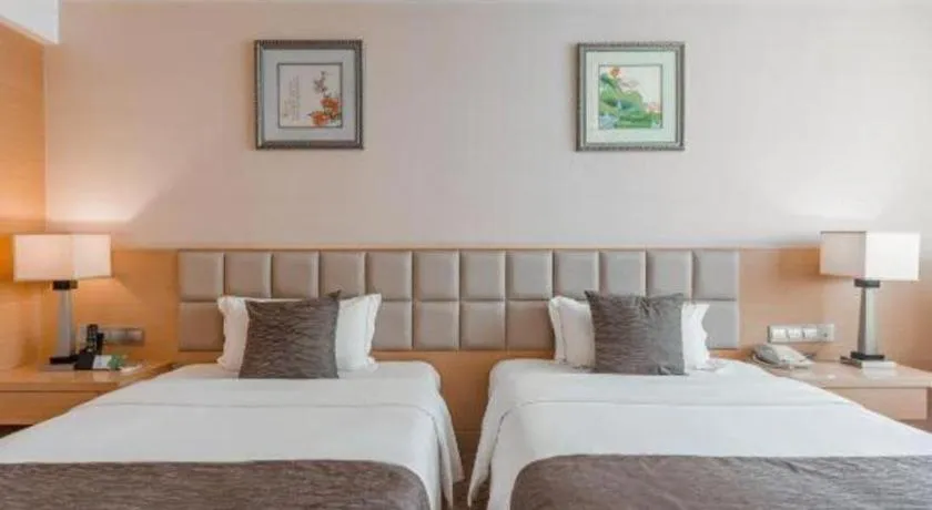 Bed in Chengdu Yinsheng International Hotel