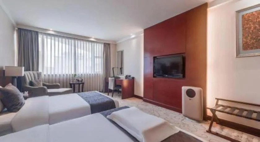 Bed in Chengdu Yinsheng International Hotel