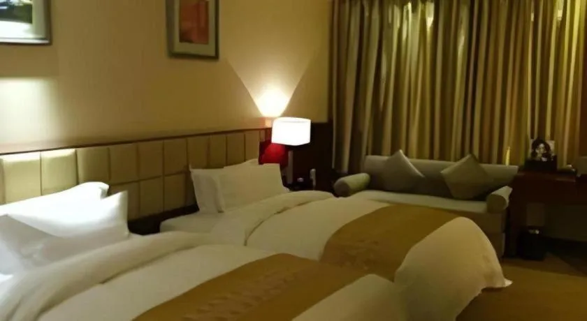 Bed in Chengdu Yinsheng International Hotel