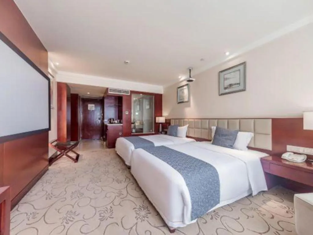 Bed in Chengdu Yinsheng International Hotel