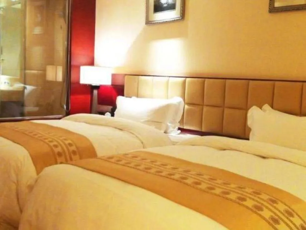 Bed in Chengdu Yinsheng International Hotel