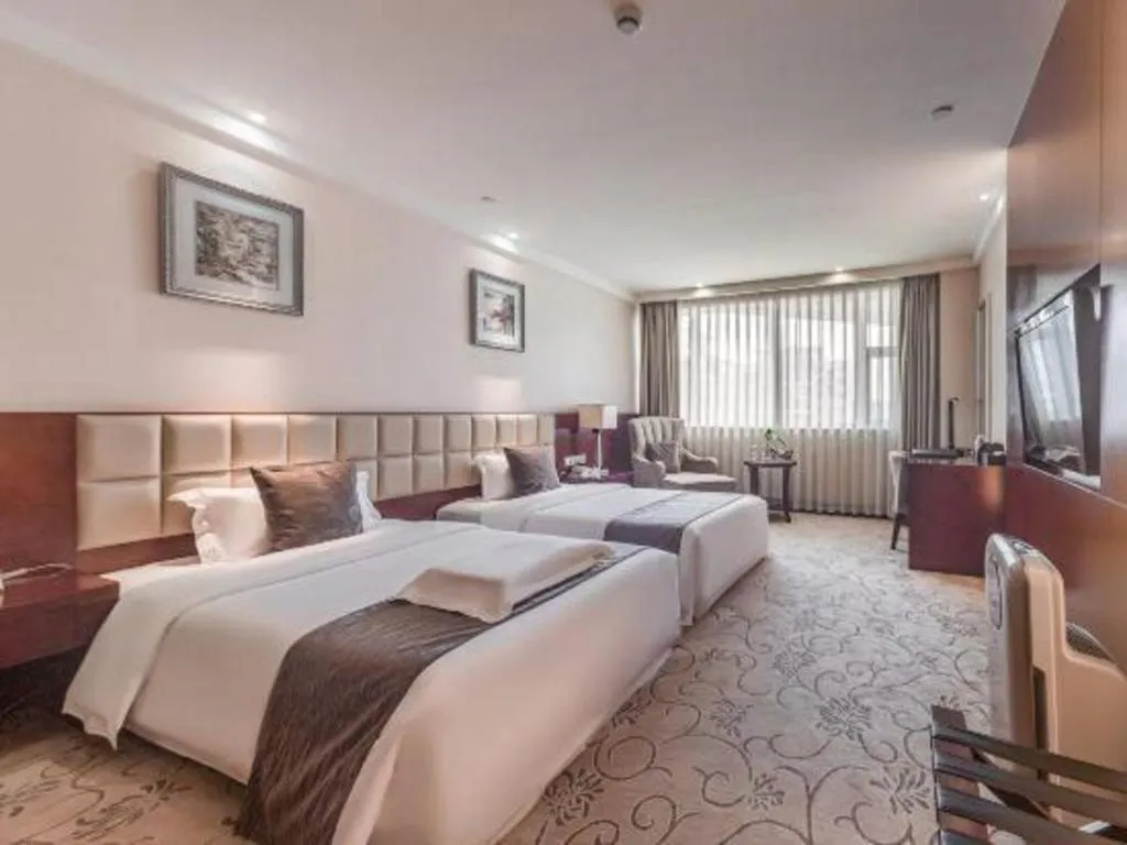 Bed in Chengdu Yinsheng International Hotel