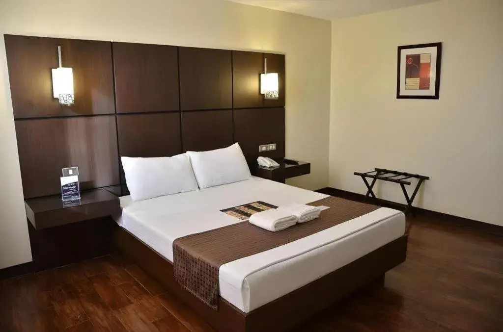 Bed in The Grande Suites Bed in The Grande Suites