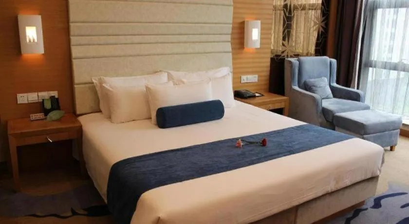 Bed in Ningbo East Shipu Hotel