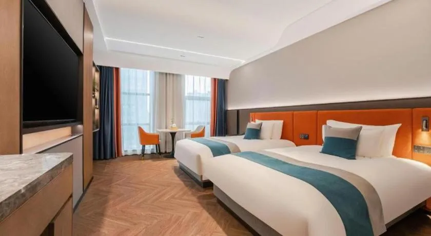 Bed in Ningbo East Shipu Hotel