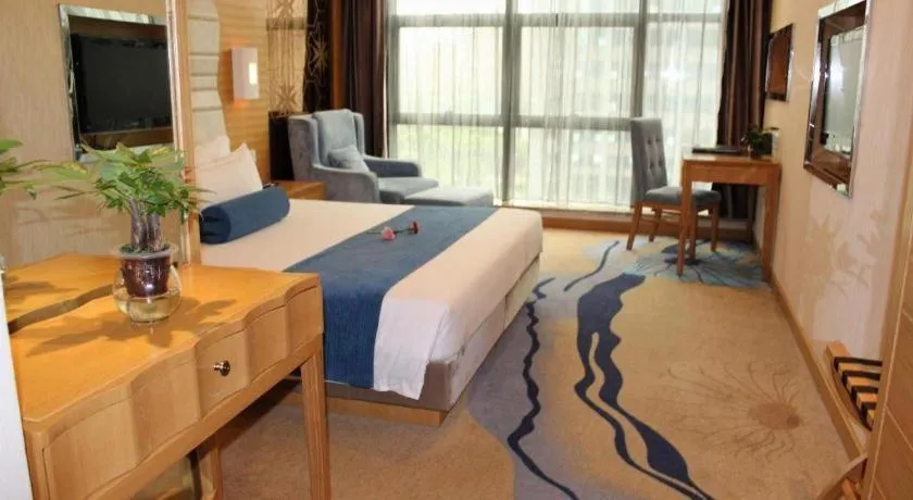 Bed in Ningbo East Shipu Hotel