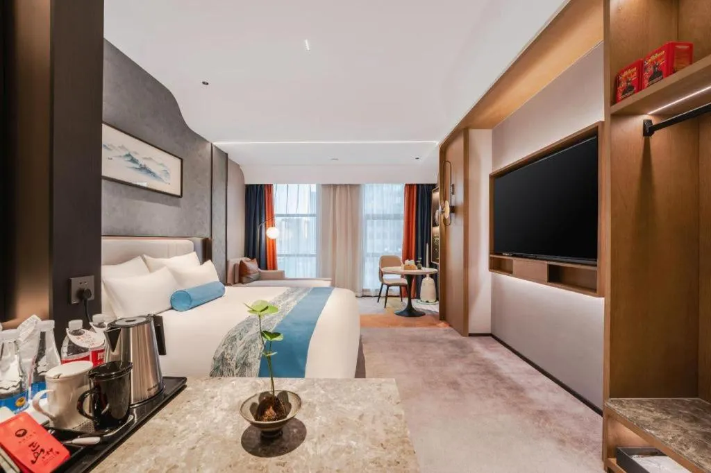 Bed in Ningbo East Shipu Hotel