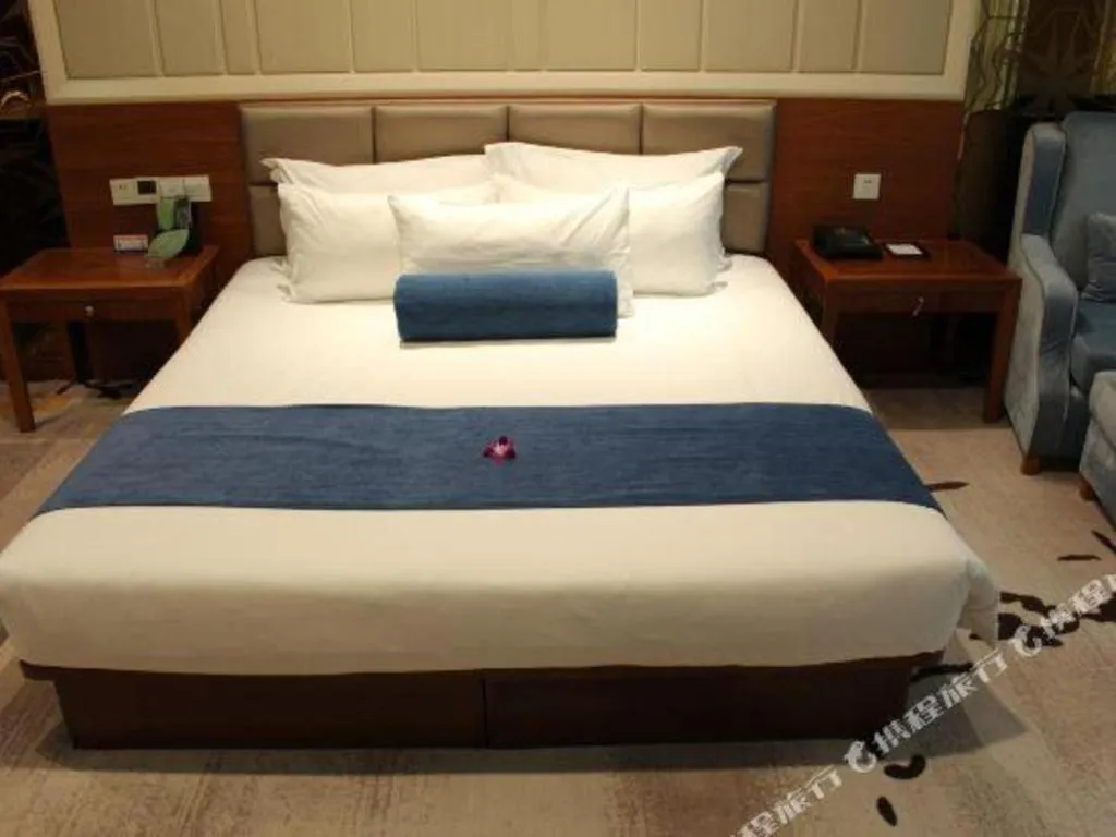 Bed in Ningbo East Shipu Hotel