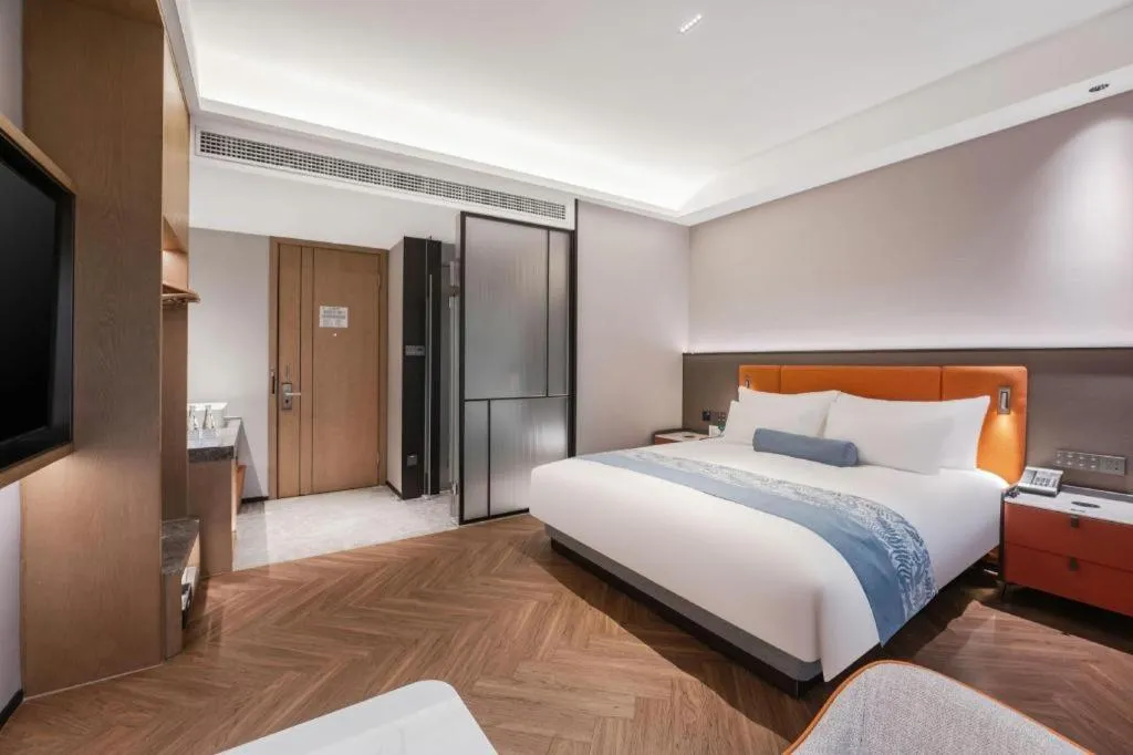 Bed in Ningbo East Shipu Hotel