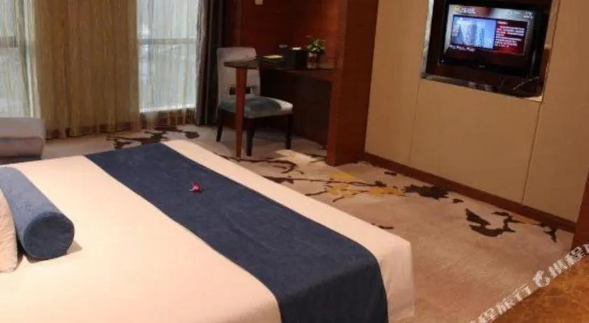 Bed in Ningbo East Shipu Hotel