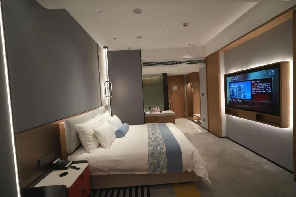 Bed in Ningbo East Shipu Hotel