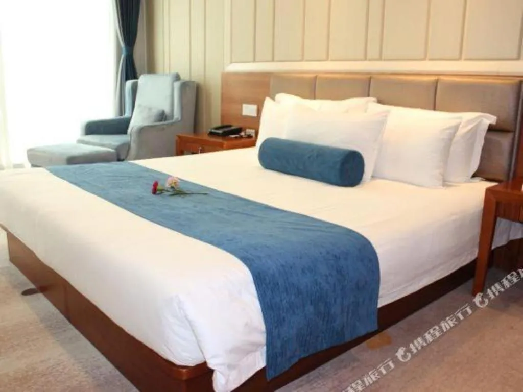 Bed in Ningbo East Shipu Hotel