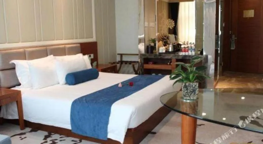 Bed in Ningbo East Shipu Hotel