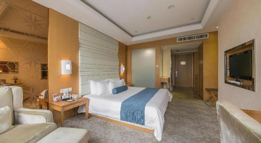 Bed in Ningbo East Shipu Hotel