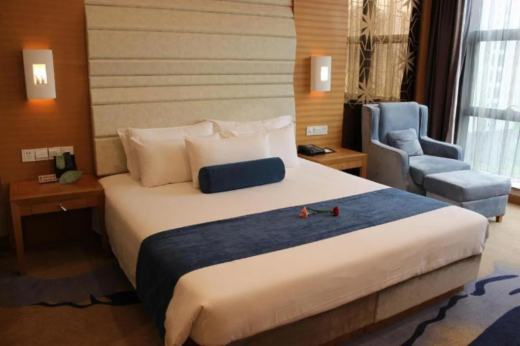 Bed in Ningbo East Shipu Hotel