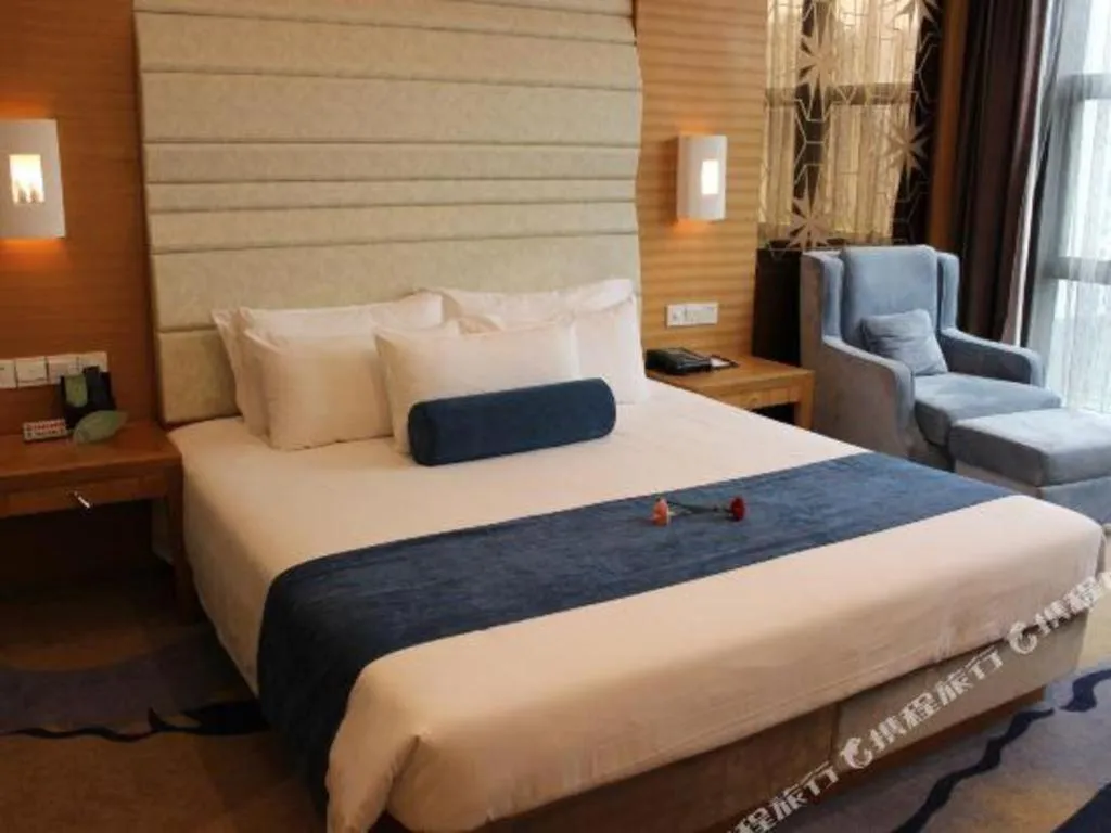 Bed in Ningbo East Shipu Hotel