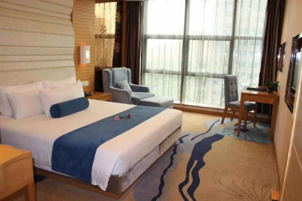 Bed in Ningbo East Shipu Hotel