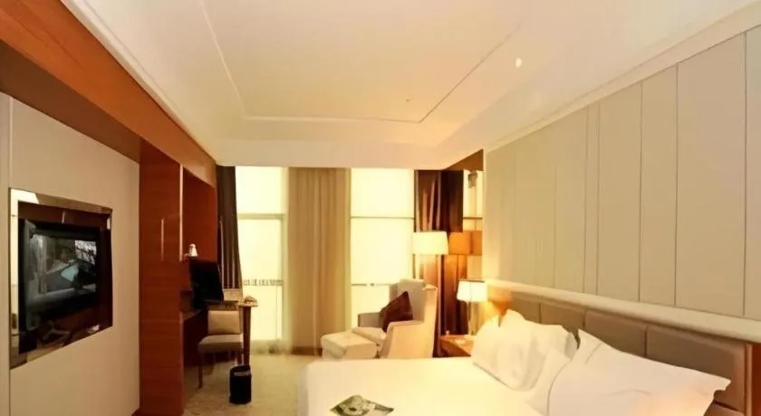 Bed in Ningbo East Shipu Hotel