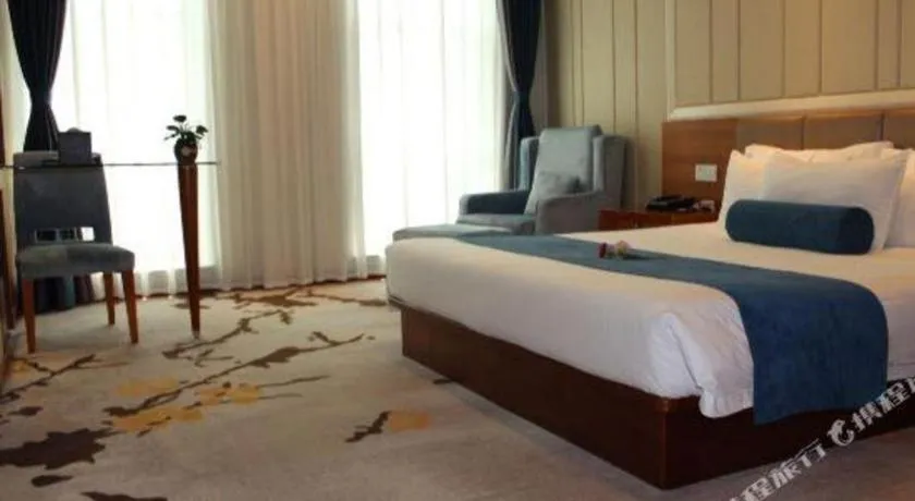 Bed in Ningbo East Shipu Hotel