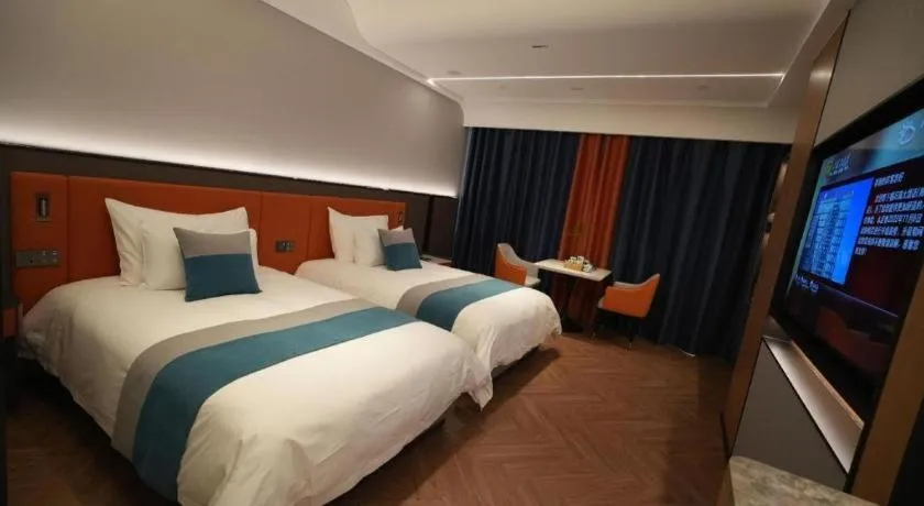 Bed in Ningbo East Shipu Hotel