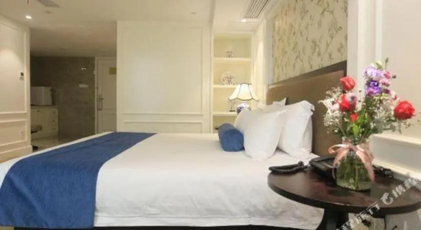 Bed in Ningbo East Shipu Hotel