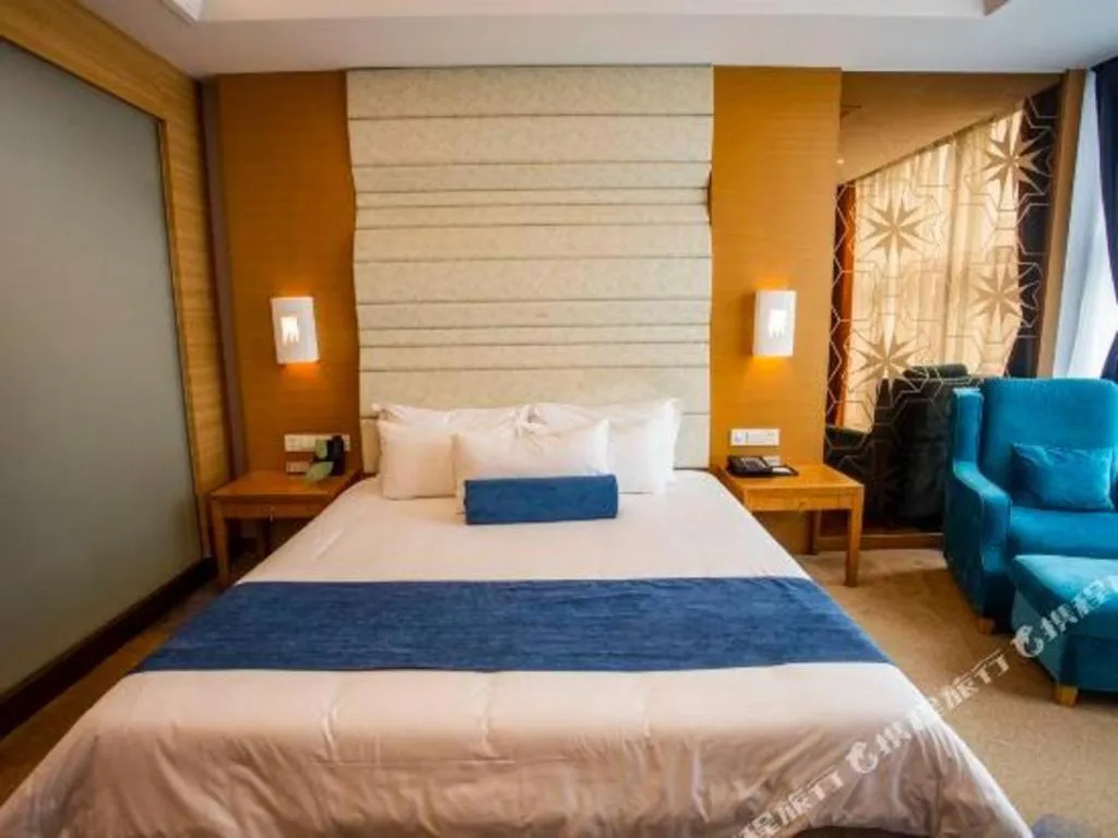 Bed in Ningbo East Shipu Hotel