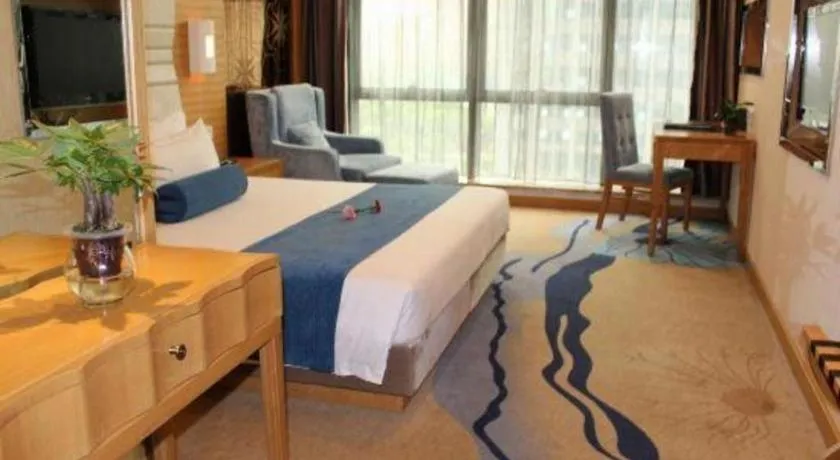 Bed in Ningbo East Shipu Hotel