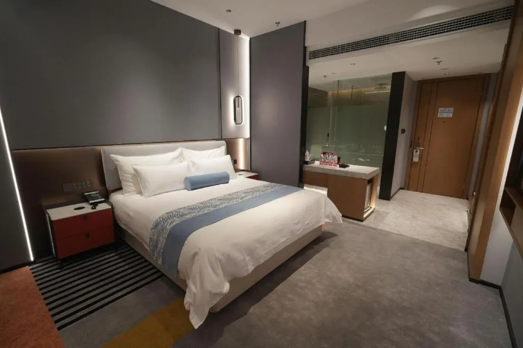 Bed in Ningbo East Shipu Hotel