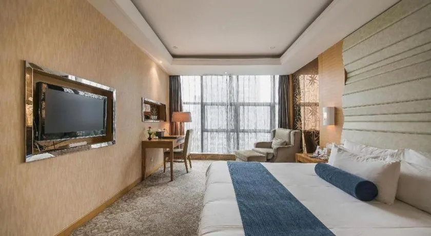 Bed in Ningbo East Shipu Hotel