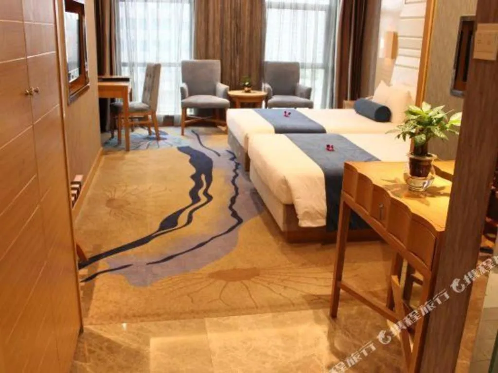 Bed in Ningbo East Shipu Hotel