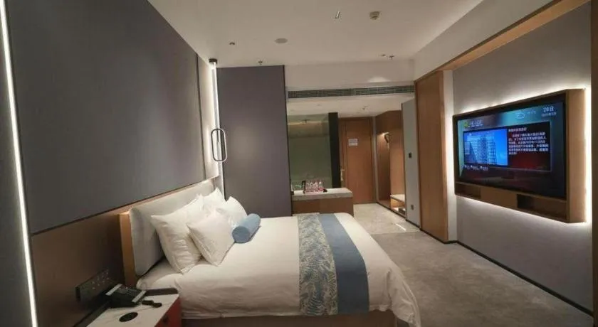 Bed in Ningbo East Shipu Hotel