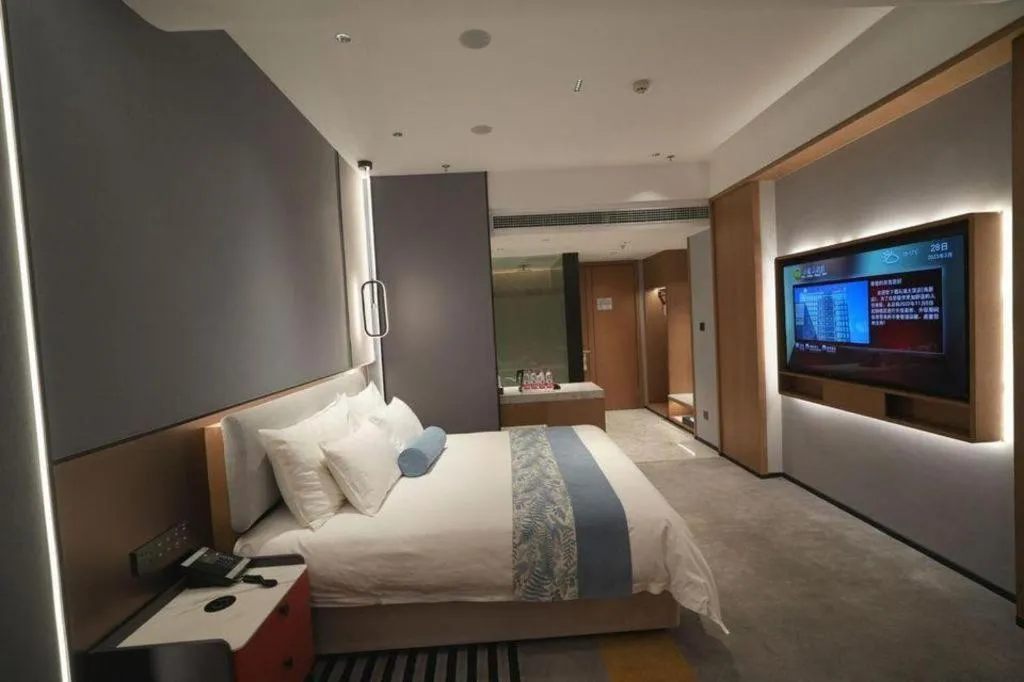 Bed in Ningbo East Shipu Hotel