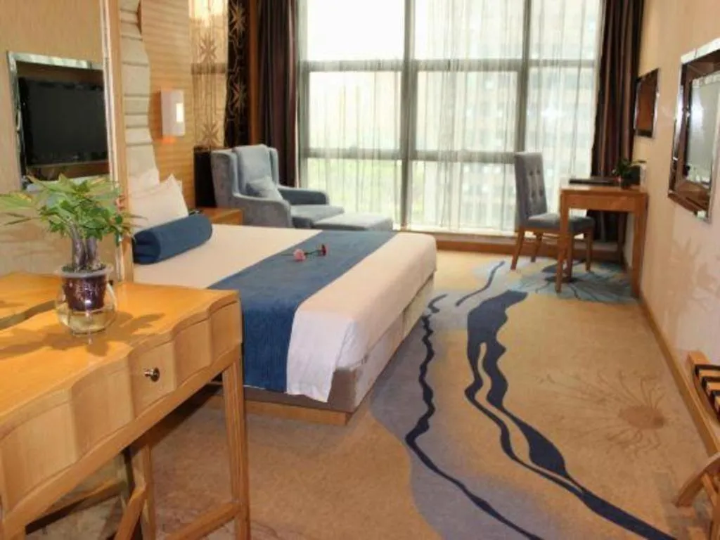 Bed in Ningbo East Shipu Hotel