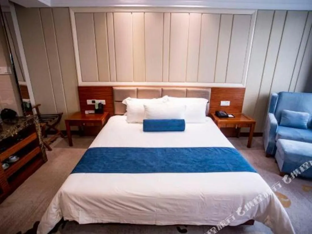 Bed in Ningbo East Shipu Hotel