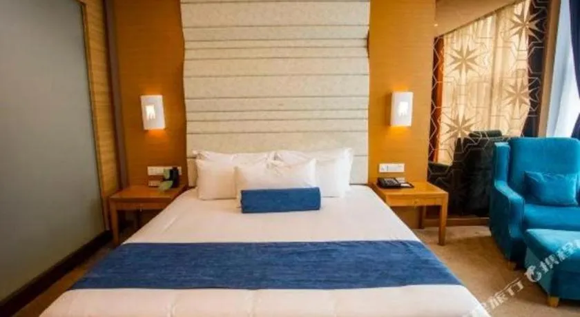 Bed in Ningbo East Shipu Hotel