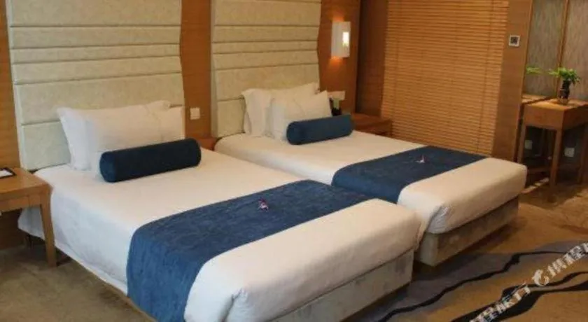 Bed in Ningbo East Shipu Hotel