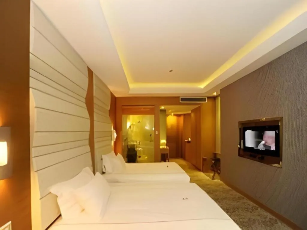 Bed in Ningbo East Shipu Hotel