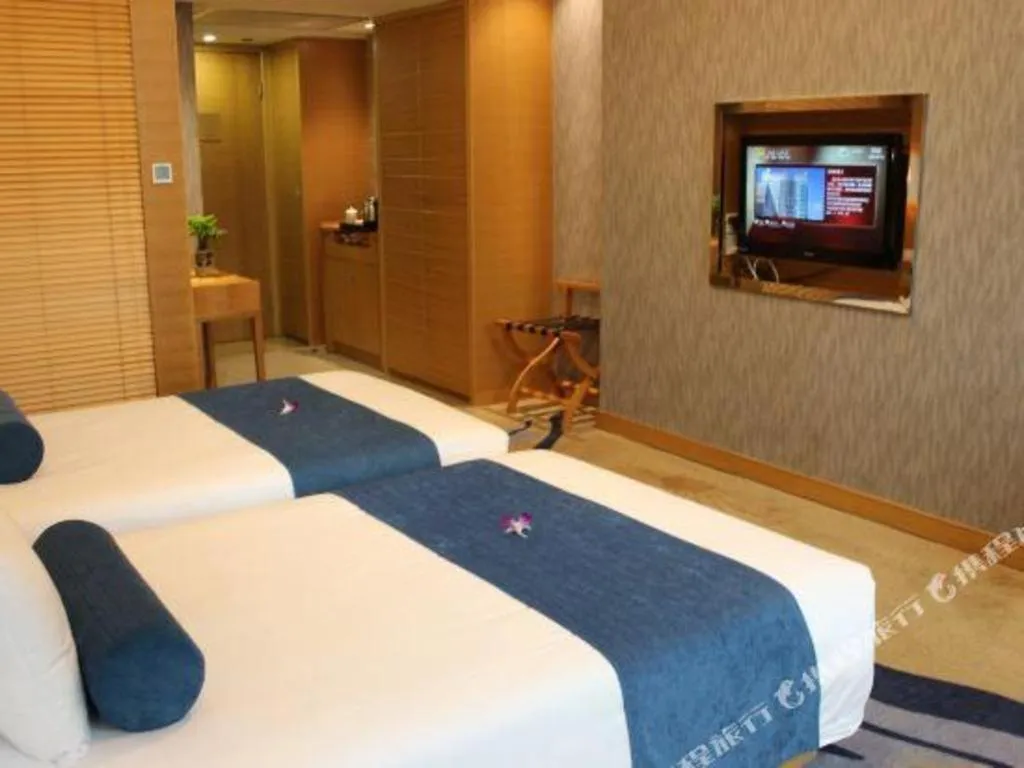Bed in Ningbo East Shipu Hotel