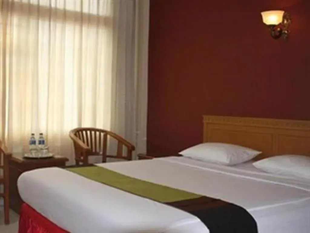 Bed in Lintas Sumatra Hotel Bed in Lintas Sumatra Hotel